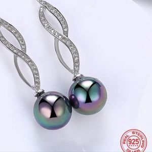 Tornasol zircon pearls earrings